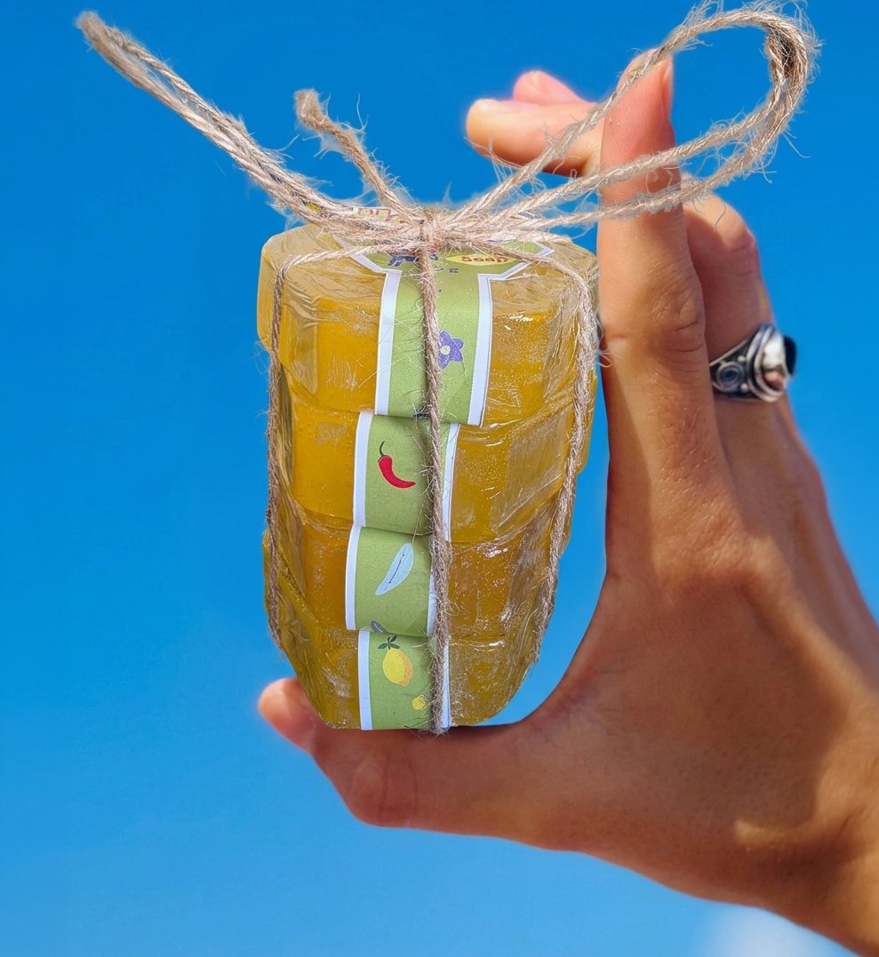 A wrapped jar held against the sky